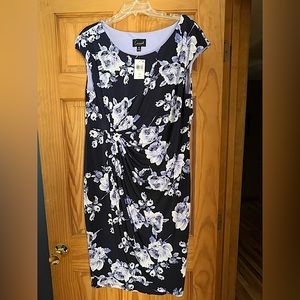 Floral dress that’s stunning! Black with lavender flowers.  NEW WITH TAGS